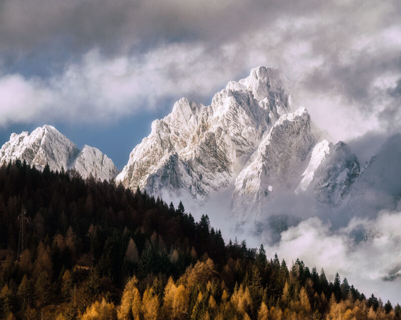 The rugged Marmarole peaks beneath dramatic storm clouds on an autumn day in the UNESCO-listed Italian Dolomites.