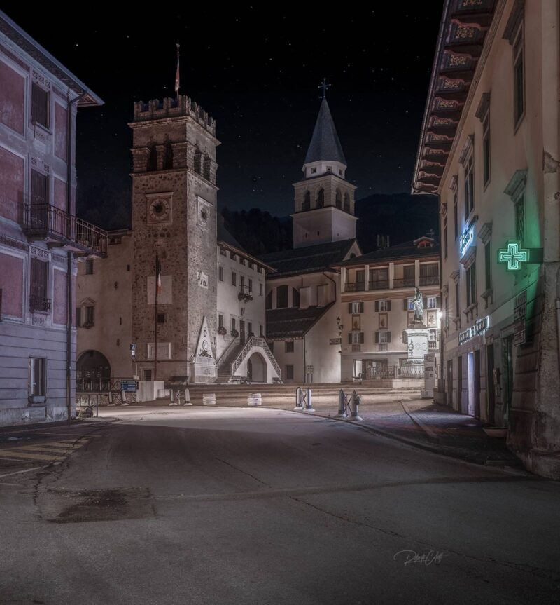 Night view of the historic center of Pieve di Cadore in the Italian Dolomites, birthplace of the Renaissance painter Titian (Tiziano Vecellio)